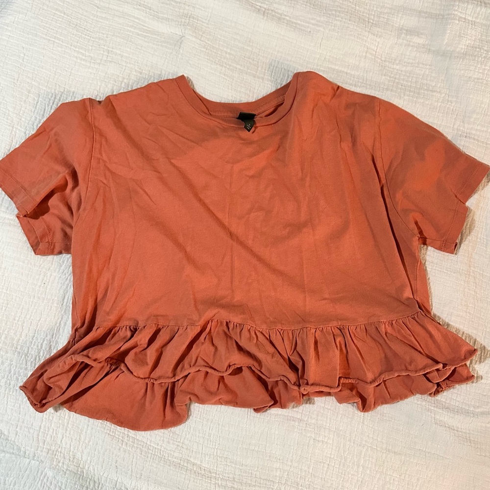 Orange ruffle crop top